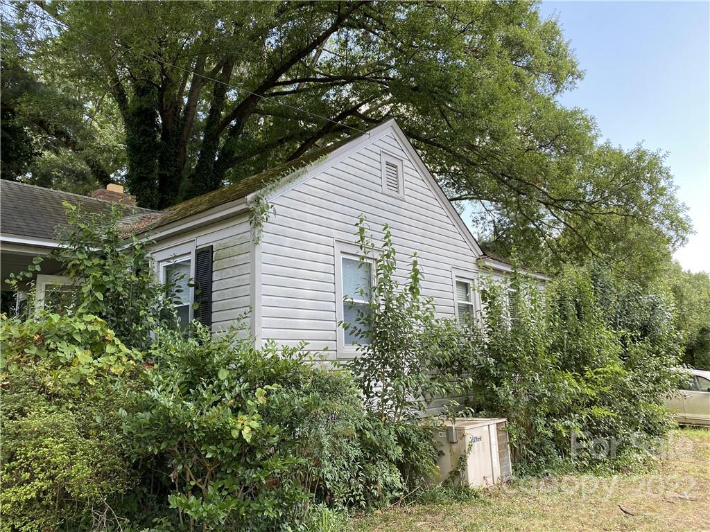 6313 Tuckaseegee Road Charlotte, NC 28208 - Photo 4 of 15 a house view with a outdoor space