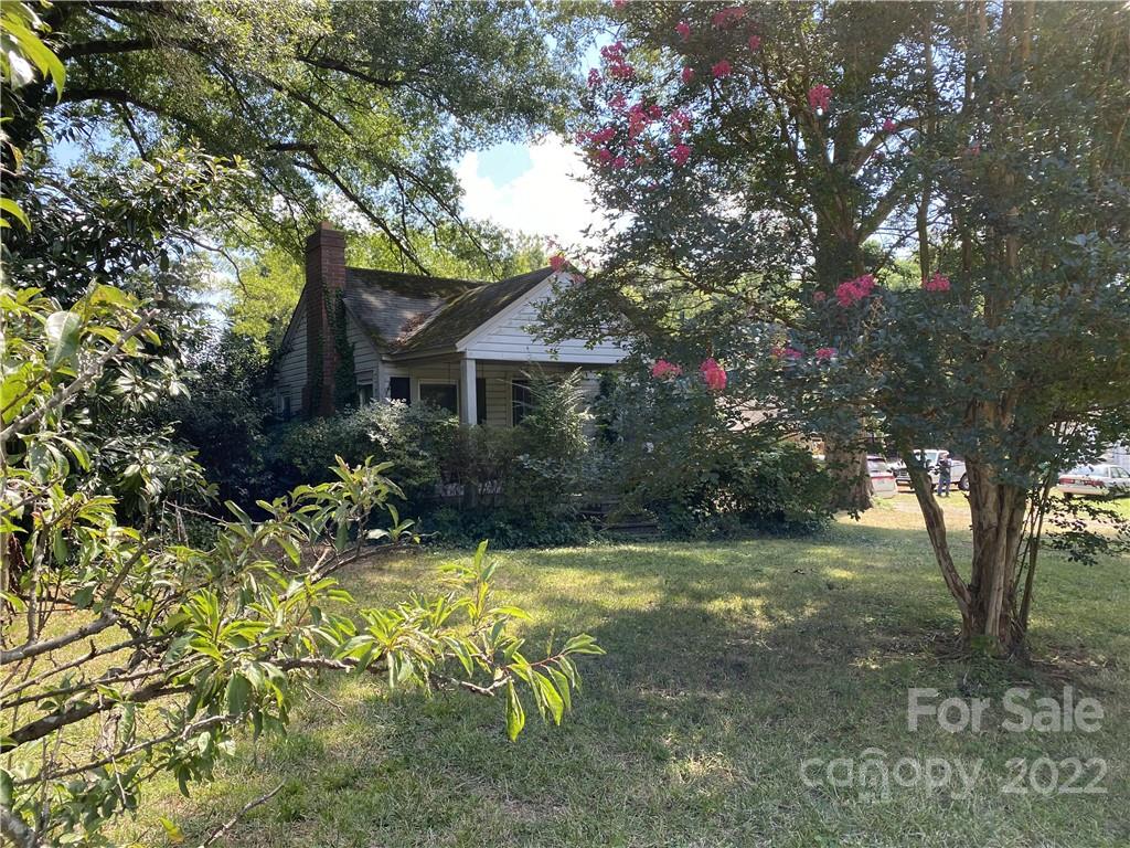 6313 Tuckaseegee Road Charlotte, NC 28208 - Photo 5 of 15 a view of a house with swimming pool