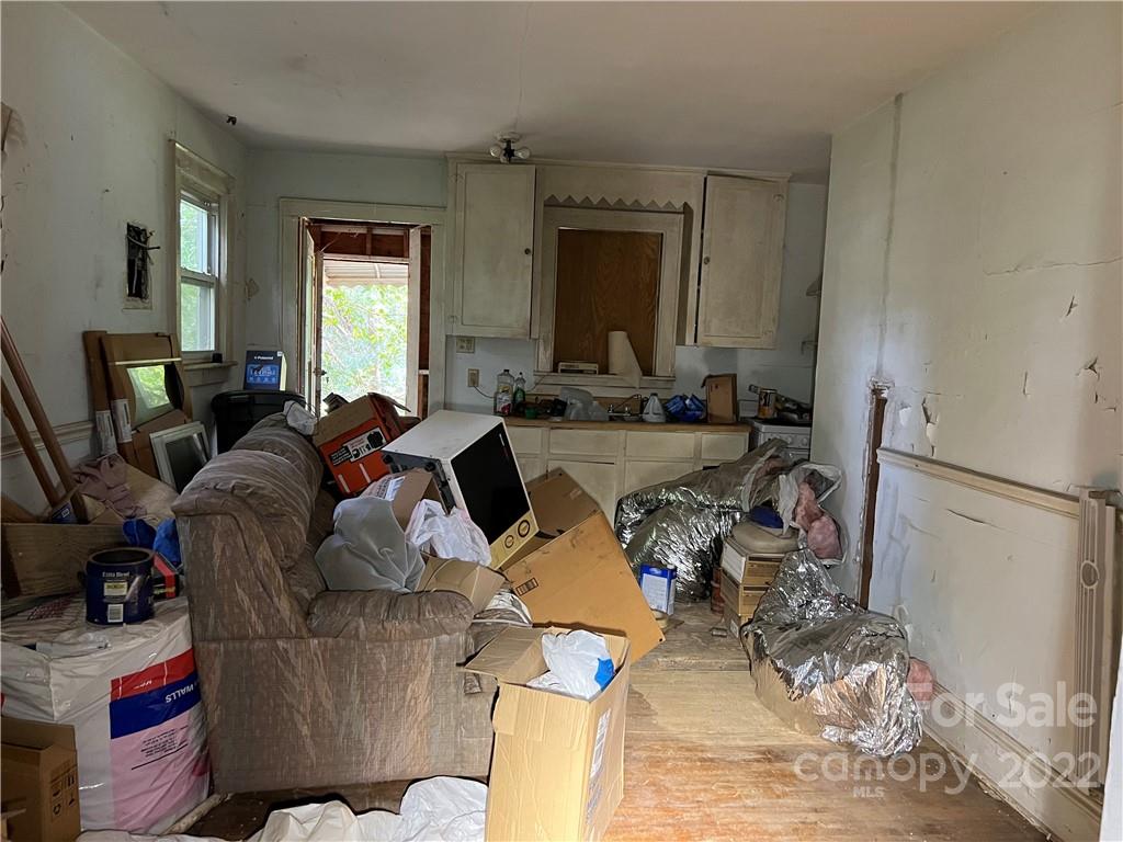 6313 Tuckaseegee Road Charlotte, NC 28208 - Photo 6 of 15 a living room with furniture and a large window