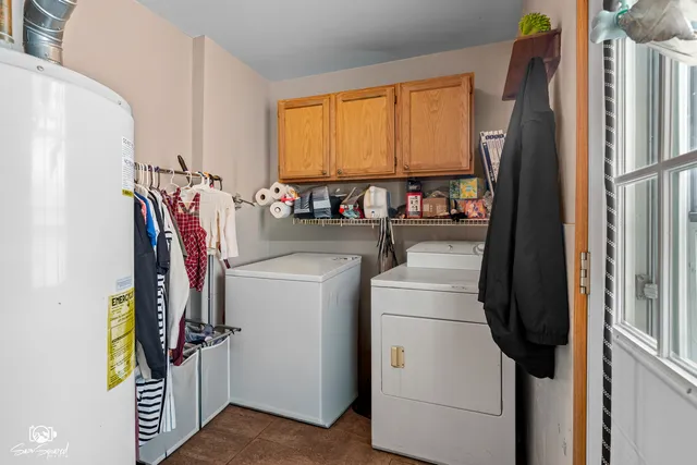 a view of kitchen with furniture and wooden floor