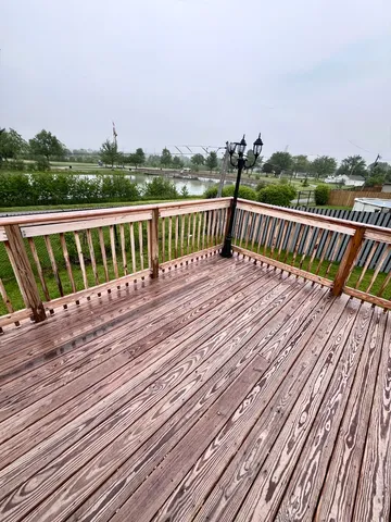 a view of a lake from a balcony