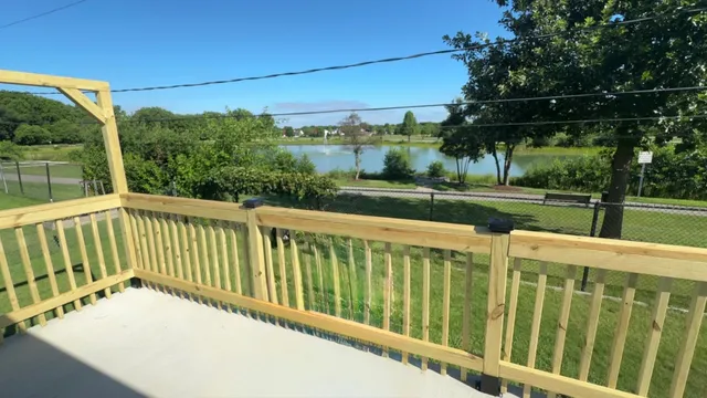 a view of a chairs and table on the deck