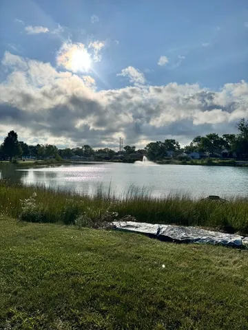 a view of outdoor space with deck and furniture