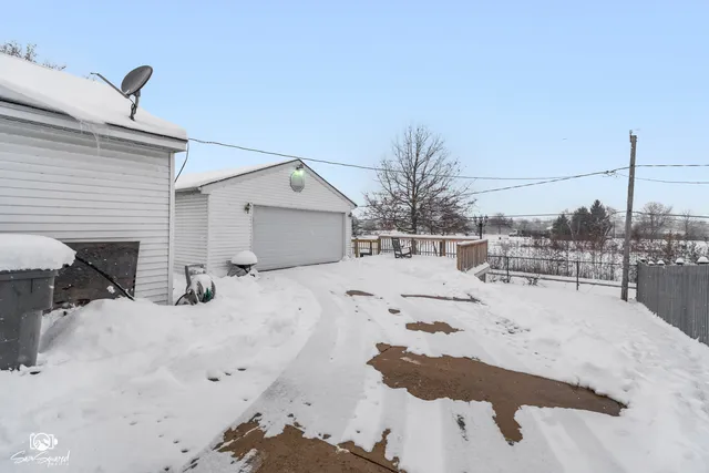 a view of a backyard of the house