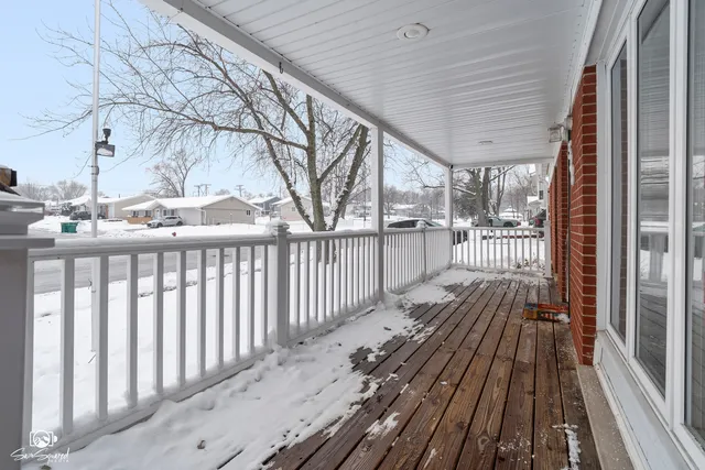a view of a wooden street from a balcony