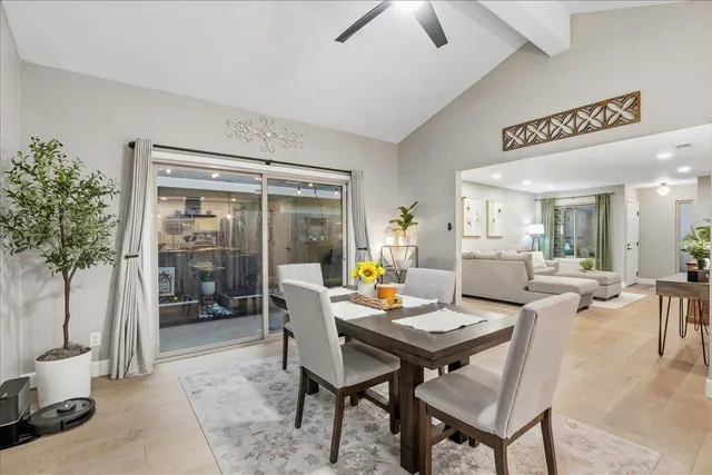 a workspace with furniture and a potted plant