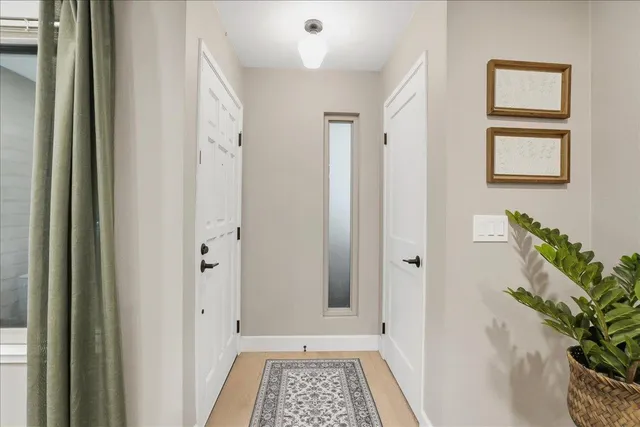 a view of room with window and hardwood