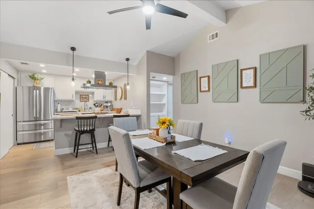 a view of a dining room with furniture