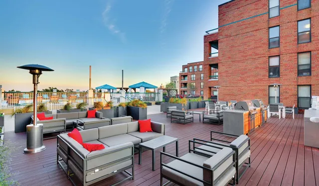 a outdoor space with patio the couches and a dining table with chairs