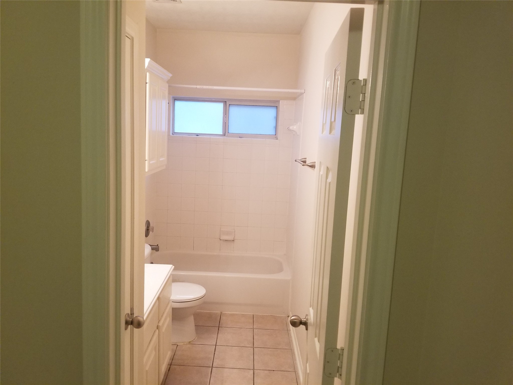 2406 Hawks Road Missouri City, TX 77489 - Photo 21 of 29 a bathroom with a granite countertop toilet and a shower