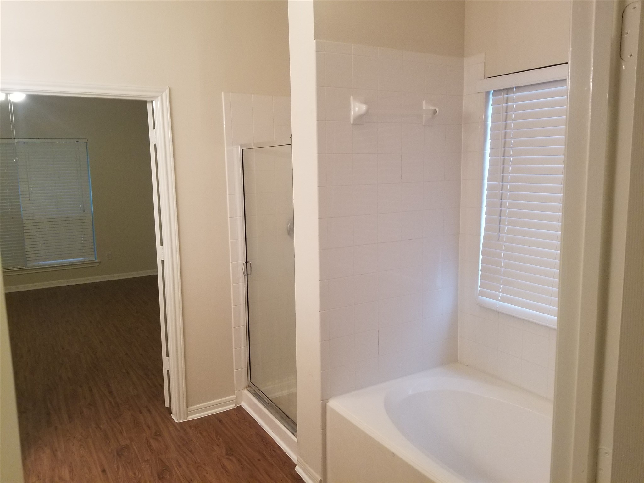2406 Hawks Road Missouri City, TX 77489 - Photo 28 of 29 a view of bathroom with bathtub and shower