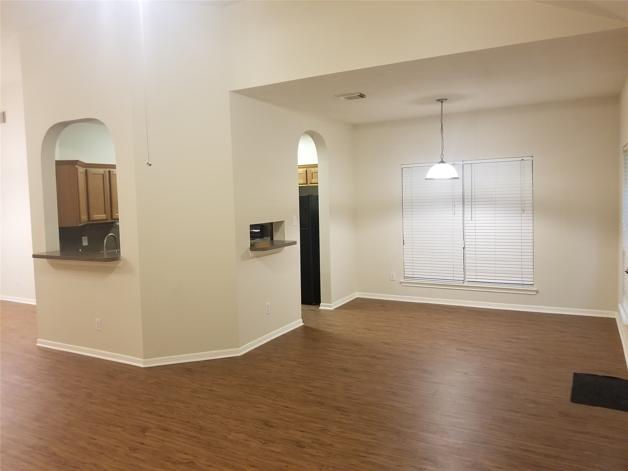 2406 Hawks Road Missouri City, TX 77489 - Photo 6 of 29 a view of a livingroom with wooden floor