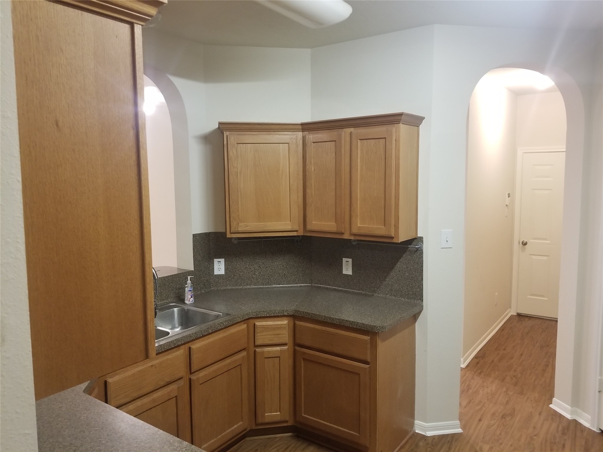 2406 Hawks Road Missouri City, TX 77489 - Photo 10 of 29 a kitchen with a sink and cabinets