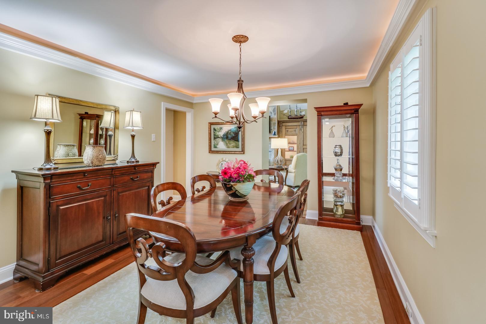 Formal Dining Room with cove lighting