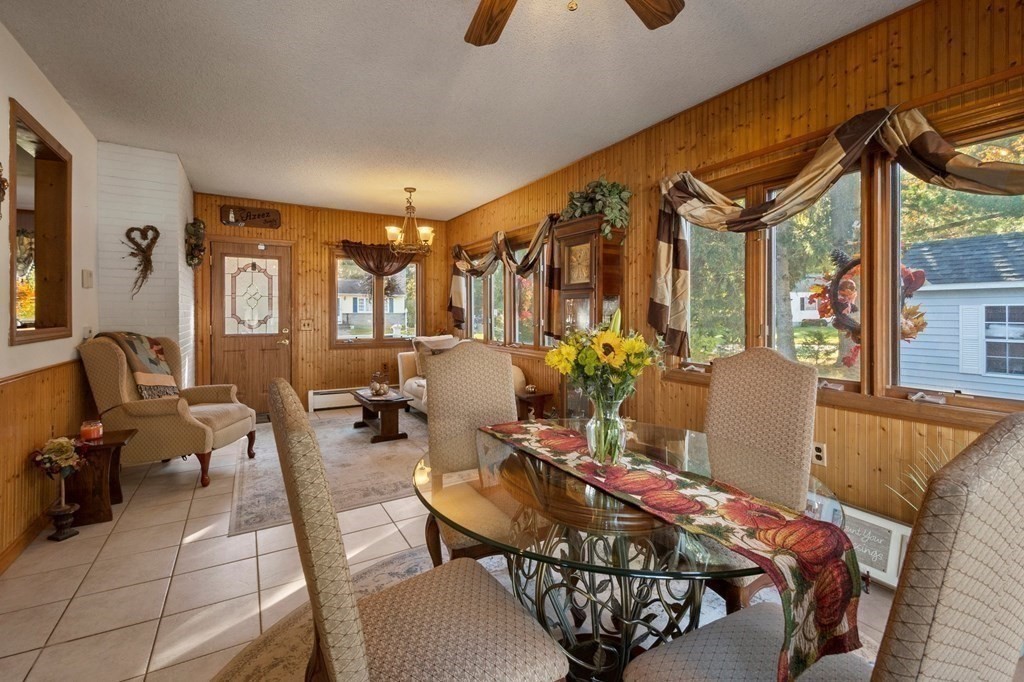 46 Timber Lane Springfield, MA 01119 - Photo 13 of 42 a view of a dining room with furniture and chandelier
