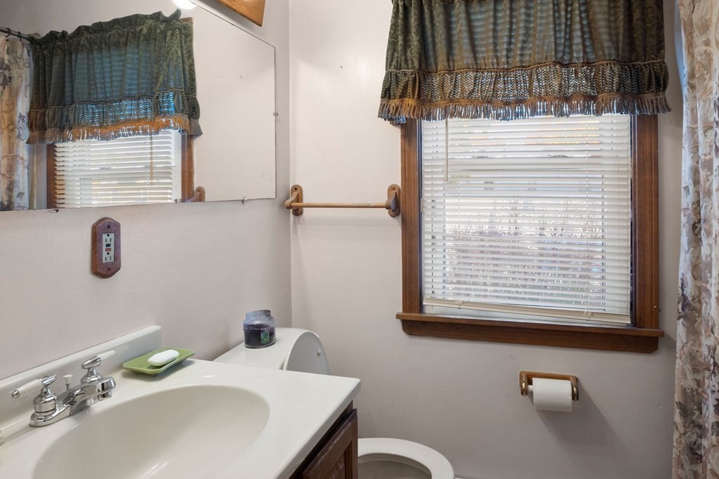 46 Timber Lane Springfield, MA 01119 - Photo 17 of 42 a bathroom with a sink and a mirror