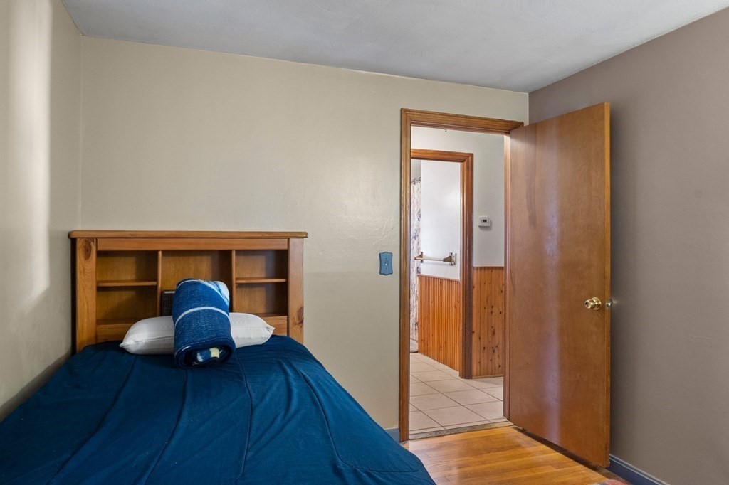 46 Timber Lane Springfield, MA 01119 - Photo 19 of 42 a view of hallway with wooden floor