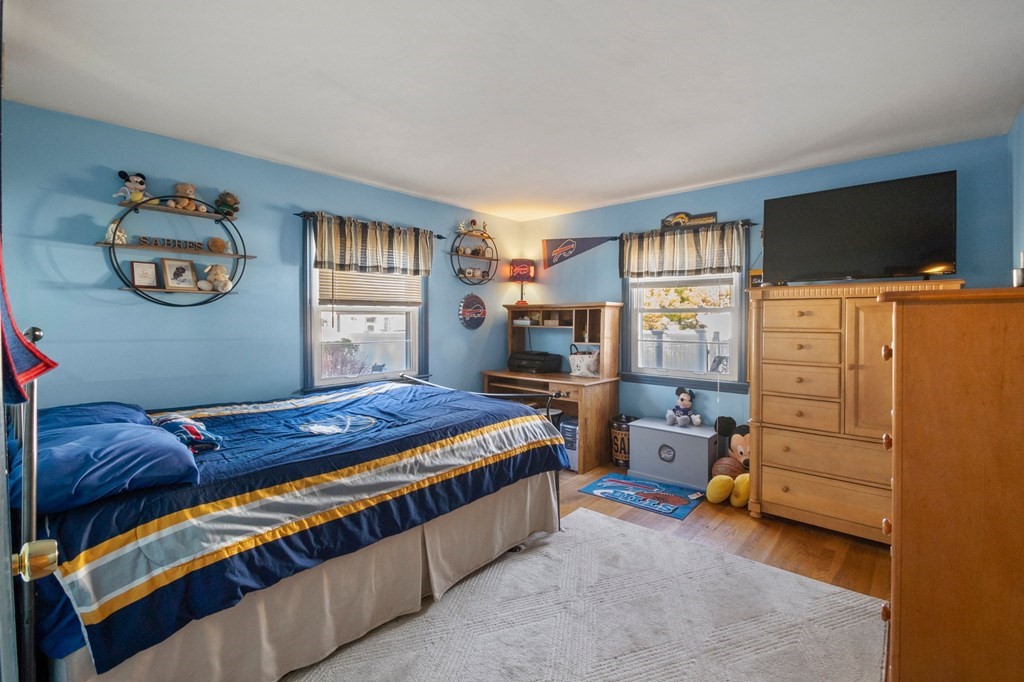 46 Timber Lane Springfield, MA 01119 - Photo 21 of 42 a bedroom with bed and a flat tv screen on dresser