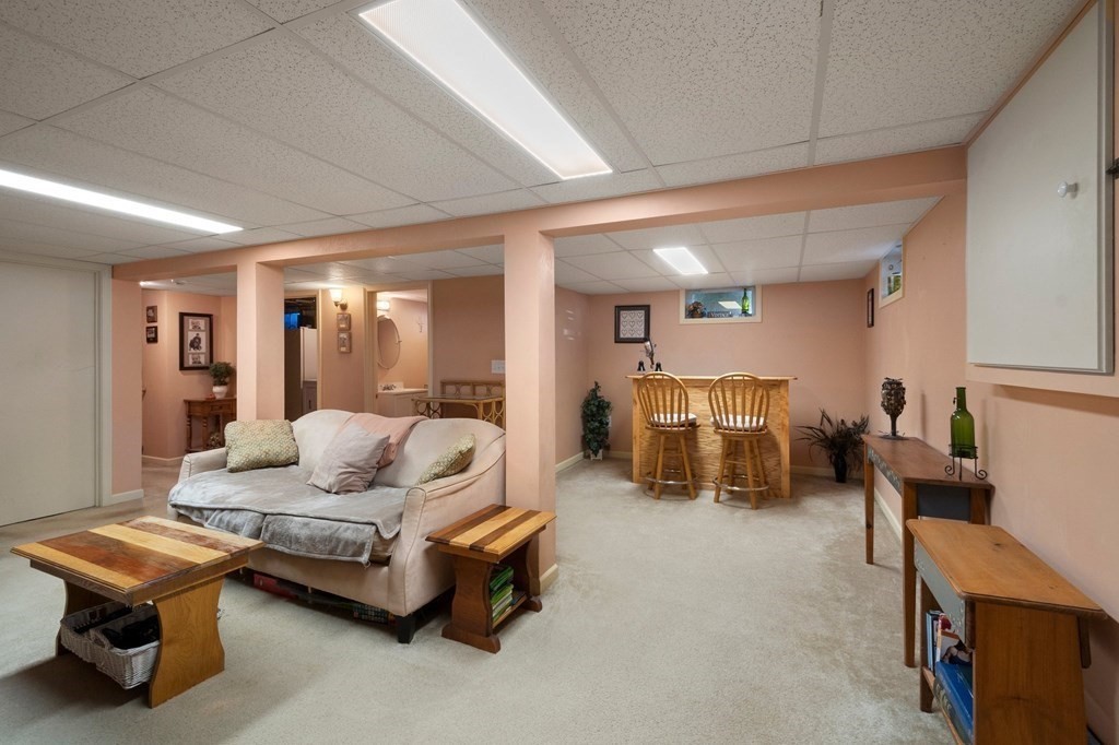 46 Timber Lane Springfield, MA 01119 - Photo 27 of 42 a living room with furniture and a table
