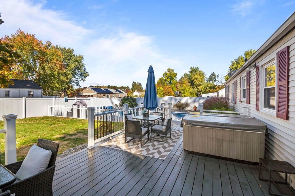 46 Timber Lane Springfield, MA 01119 - Photo 36 of 42 a view of a patio with chairs and potted plants