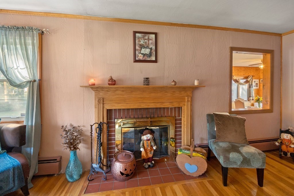 46 Timber Lane Springfield, MA 01119 - Photo 7 of 42 a living room with furniture and a fireplace