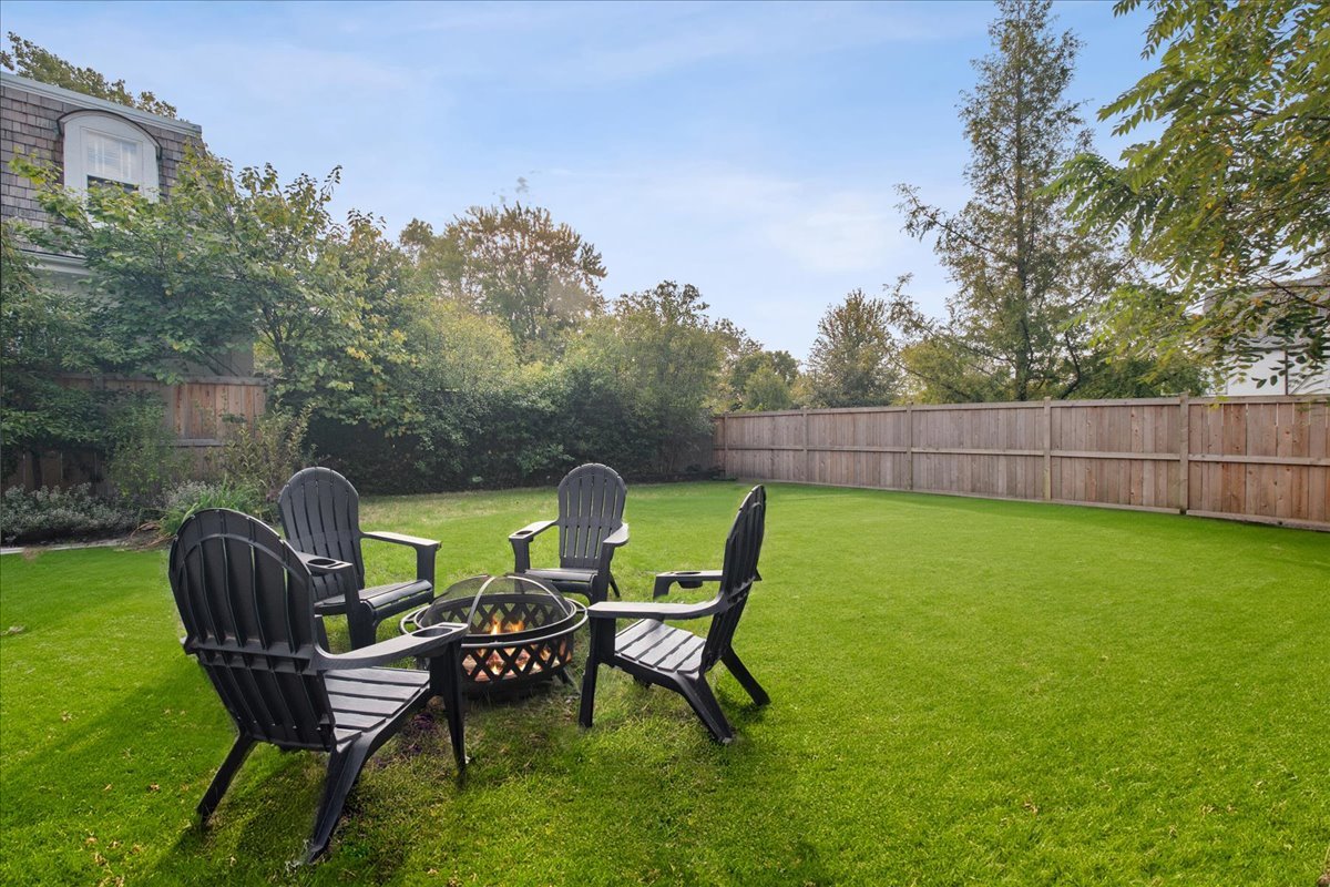 880 Willow Road Winnetka, IL 60093 - Photo 19 of 23 a view of a chairs and table in the garden