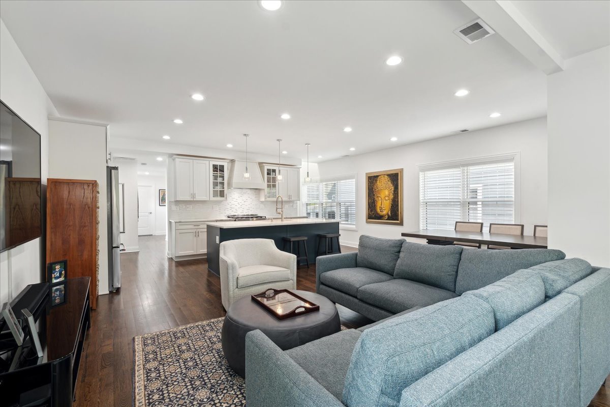 880 Willow Road Winnetka, IL 60093 - Photo 5 of 23 a living room with furniture and a flat screen tv