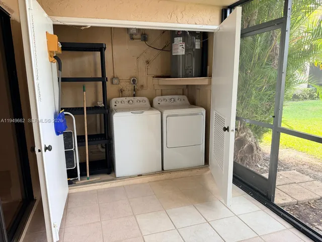 a view of a yard with an outdoor seating