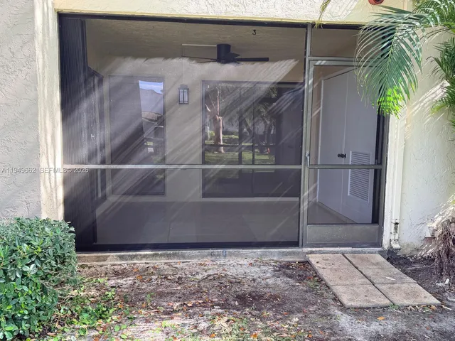 a view of a park with a tree