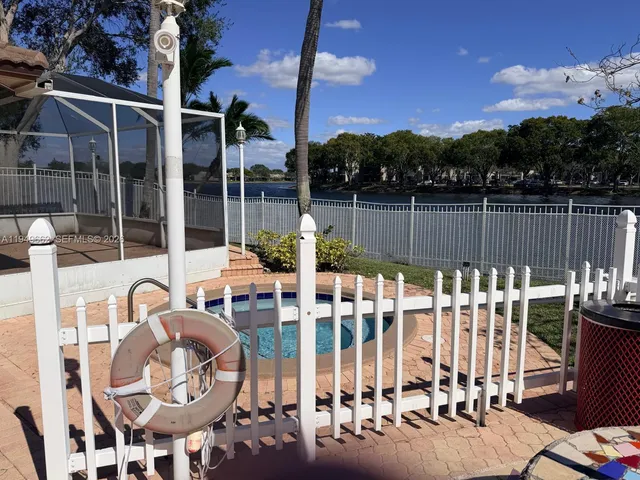 a view of roof deck with lake view