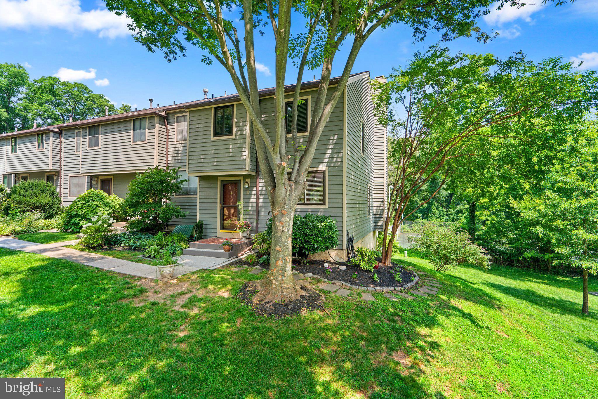 2 Stone Ridge Court Baltimore, MD 21239 - Photo 1 of 45 front view of a house with a yard