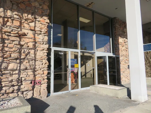 a view of a house with a door and a window