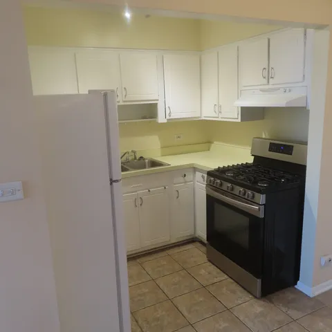 an empty room with a wooden door