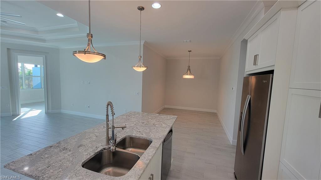 6378 Negril Isle Drive Naples, FL 34113 - Photo 5 of 15 a view of kitchen island