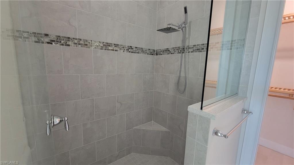 6378 Negril Isle Drive Naples, FL 34113 - Photo 9 of 15 a bathroom with a shower