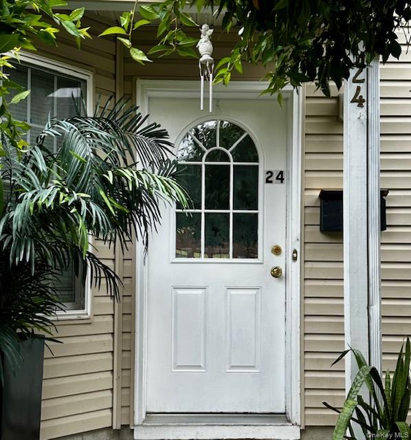 24 Partition Street Haverstraw, NY 10927 - Photo 2 of 8 a front view of a house with a yard
