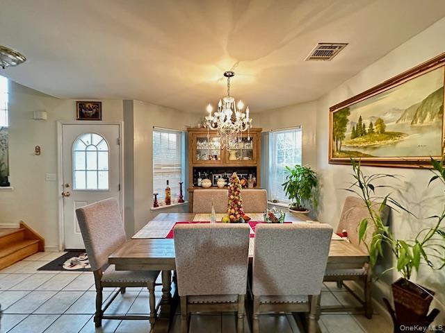 24 Partition Street Haverstraw, NY 10927 - Photo 6 of 8 a view of a dining room with furniture and a chandelier