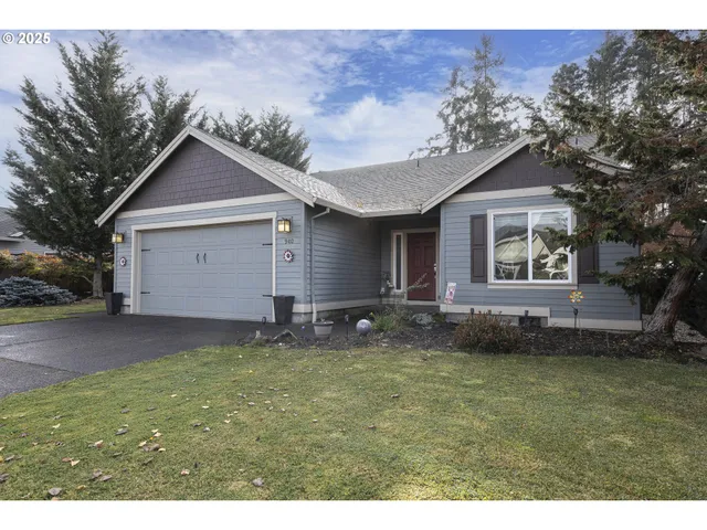 a house view with a garden space