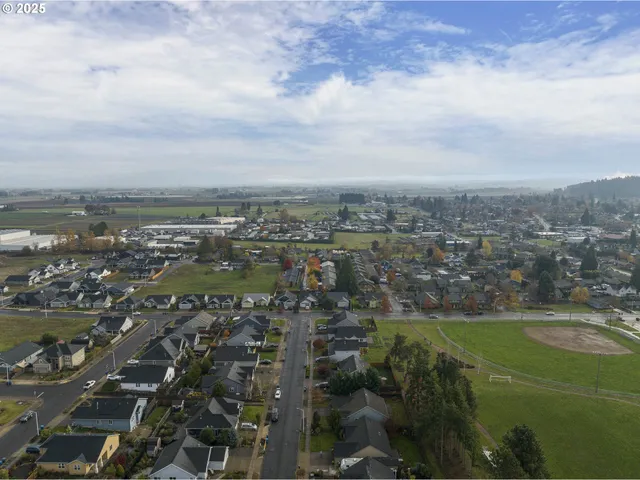 an aerial view of a city with lots of residential buildings