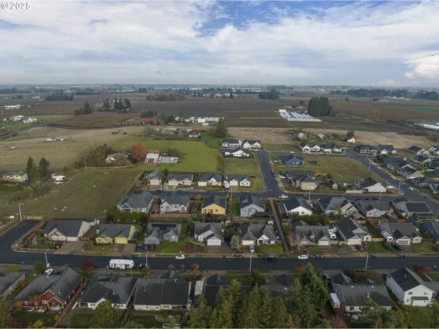 an aerial view of a city with lots of residential buildings