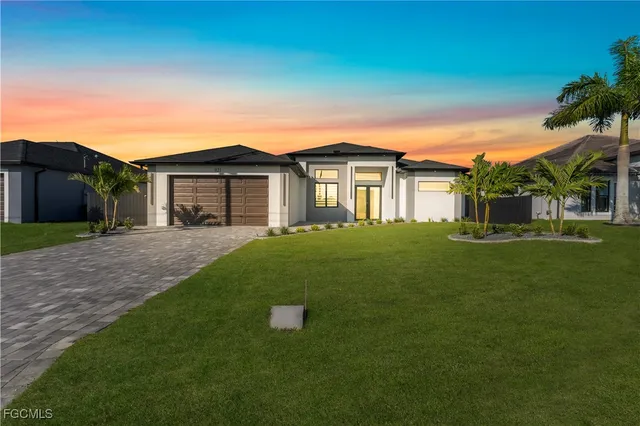 a view of a house with a big yard