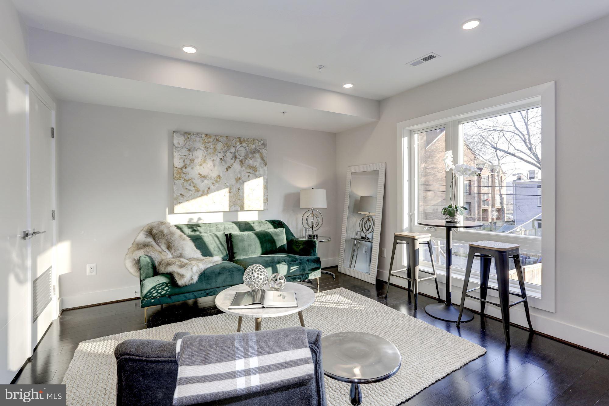 1331 K Street Southeast, Unit 203 Washington, DC 20003 - Photo 6 of 16 Living area has lots of natural light