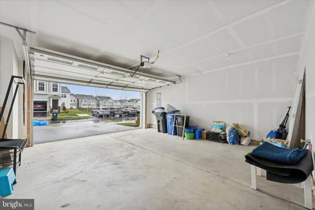 a bedroom with furniture and a flat screen tv