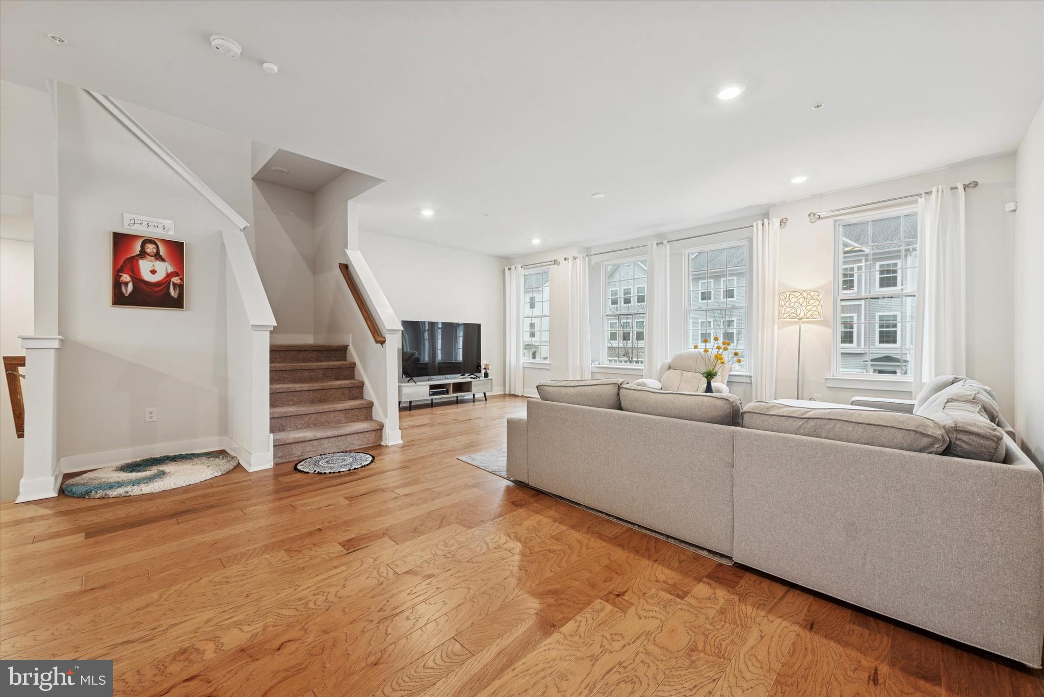 235 Red Leaf Lane Exton, PA 19341 - Photo 4 of 25 a living room with furniture and stairs