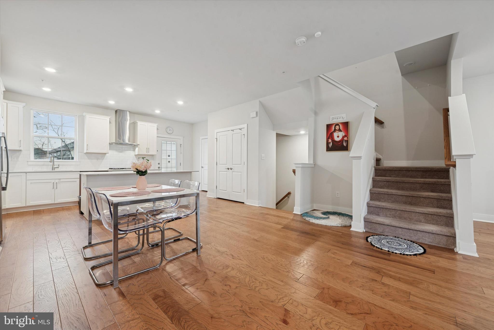 235 Red Leaf Lane Exton, PA 19341 - Photo 6 of 25 a kitchen with a table and chairs in it