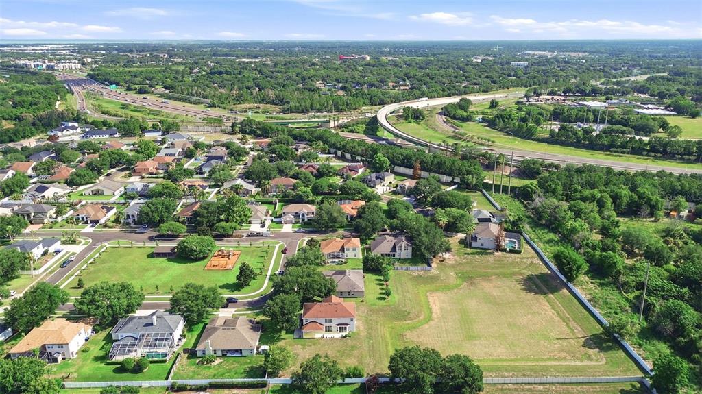 936 Kingsridge Circle Gotha, FL 34734 - Photo 29 of 50 an aerial view of residential houses with outdoor space and trees