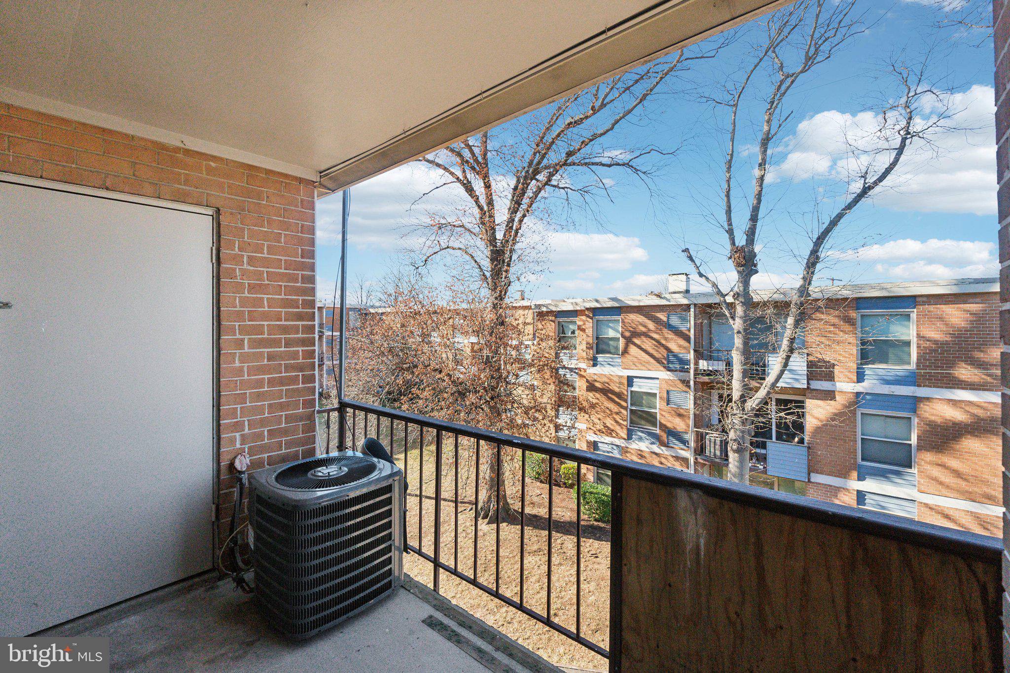 3809 St Barnabas Road, Unit T202 Suitland, MD 20746 - Photo 19 of 20 a view of balcony with furniture