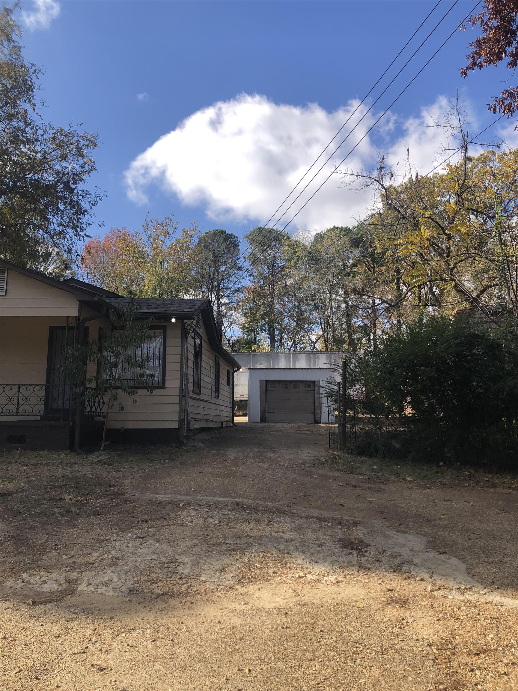 4297 Prescott Road Memphis, TN 38118 - Photo 4 of 14 a view of a house with a yard