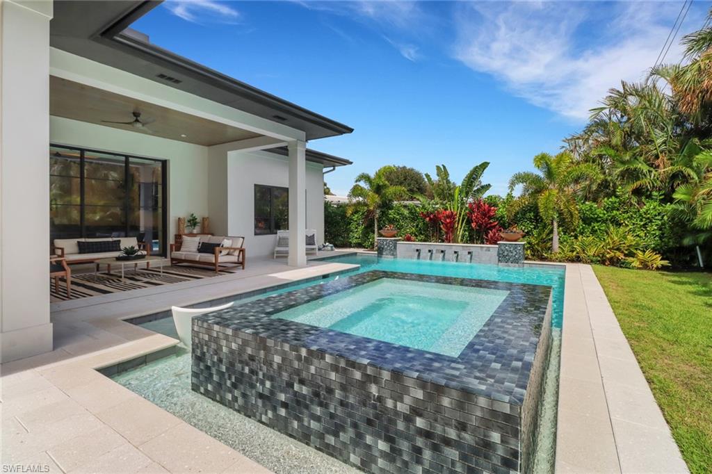 1546 Mandarin Road Naples, FL 34102 - Photo 37 of 48 View of pool with a patio, outdoor lounge area, an in ground hot tub, and ceiling fan