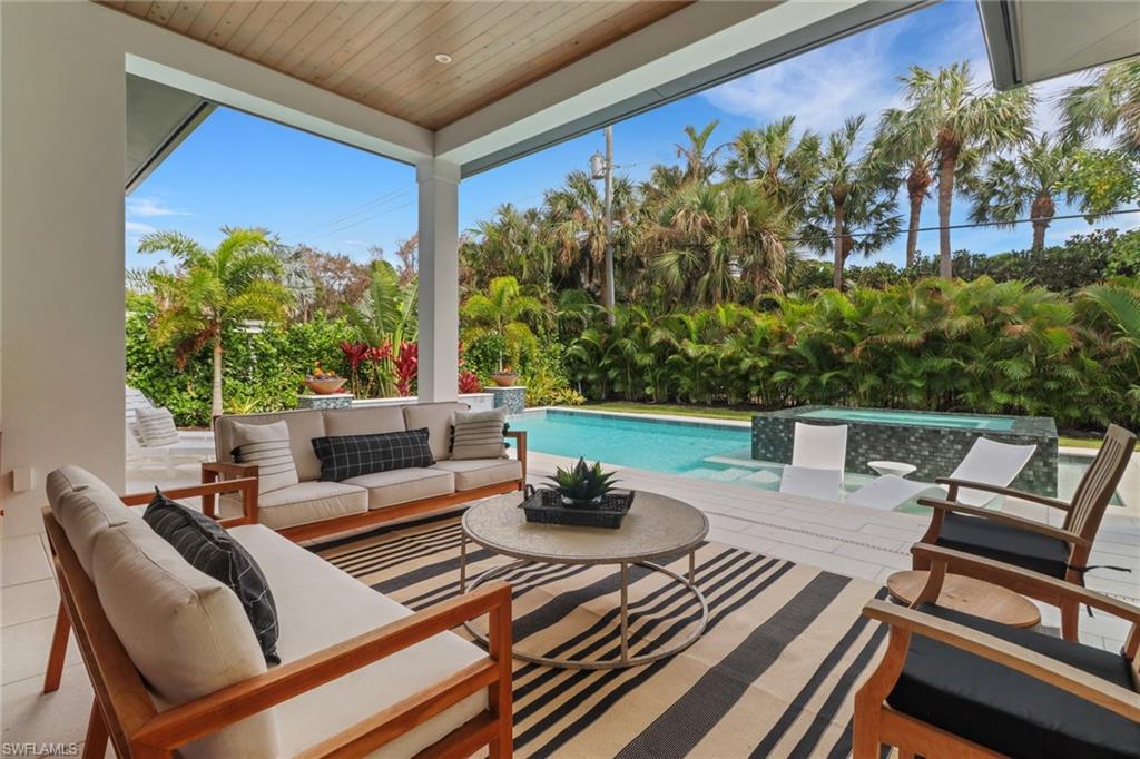 1546 Mandarin Road Naples, FL 34102 - Photo 40 of 48 View of patio featuring an outdoor living space
